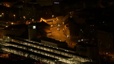 Timelapse in night with look down on city crossing and traffic moving over Stockbeeldmateriaal 132320102