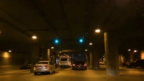 Timelapse of the night rush drive in a big city. Speedy car driving the tunnel. Stock Footage 172528267