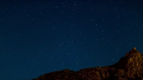 Timelapse of Night Sky behind a mountain (4k) Stock Footage 84373758