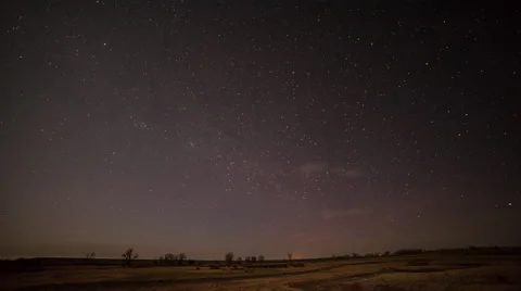 Timelapse of night sky rotating over Montana prairie Stock Footage 62654495