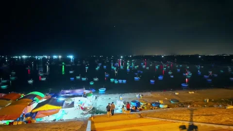 Timelapse of nighttime view of Mui Ne fishing village in Vietnam 스톡 동영상 347179799