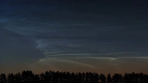 Timelapse of noctilucent clouds in the night sky 4k Stock Footage 237297250