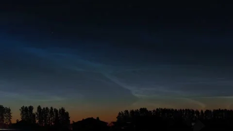 Timelapse of noctilucent clouds in the night sky 4k Stock Footage 237297339