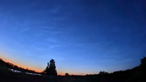 Timelapse of noctilucent clouds in the night sky 4k Stock Footage 237297571