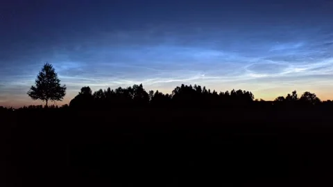 Timelapse of noctilucent clouds in the night sky 4k Stock Footage 237297612