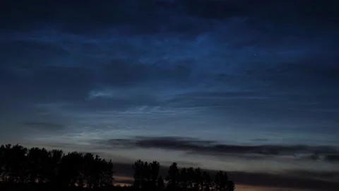 Timelapse of noctilucent clouds in the night sky 4k Stock Footage 237298504
