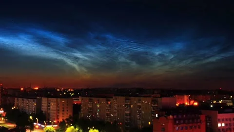 Timelapse of noctilucent clouds in the sky above the city 4k Stock Footage 237297509
