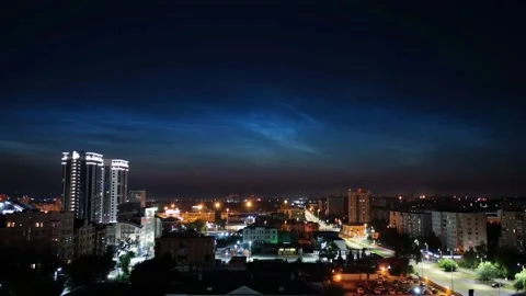 Timelapse of noctilucent clouds in the sky above the city 4k Stock Footage 237297608