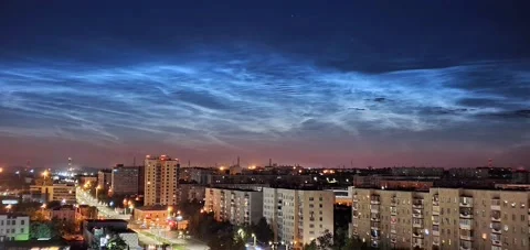 Timelapse of noctilucent clouds in the sky above the city 4k Stock Footage 237297712