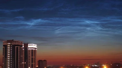 Timelapse of noctilucent clouds in the sky above the city 4k Stock Footage 237298008