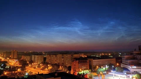 Timelapse of noctilucent clouds in the sky above the city 4k Stock Footage 237298082