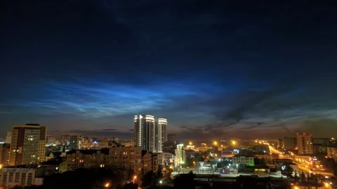 Timelapse of noctilucent clouds in the sky above the city 4k Stock Footage 237298196