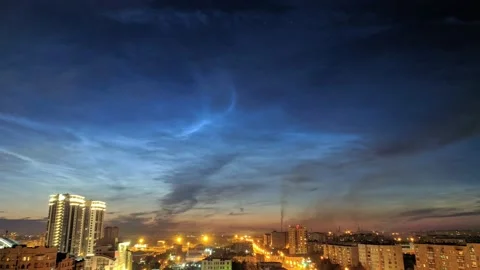 Timelapse of noctilucent clouds in the sky above the city 4k Stock Footage 237298197