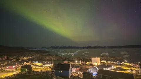 Timelapse of Northern Lights dancing over ice fjord of East Greenland Stock-Footage 332382173