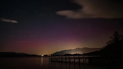 A timelapse of the Northern Lights over Ashness Jetty on Derwentwater in th.. Stock Footage 313601721