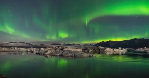 Timelapse of northern lights over Glacier Lagoon in Iceland Stock Footage