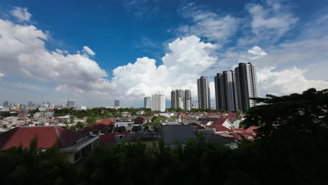 Timelapse of a not so cloudy sky in South Jakarta 1 Stock Footage 234876856