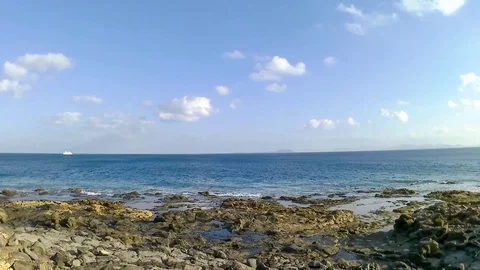 Timelapse of the ocean and clouds in Lanzarote,  Canary islands, Spain Stock Footage 75653427