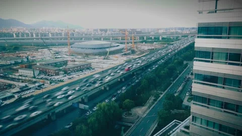 Timelapse of a Olympics construction stadium, highway and train, Hangzhou, China Stock Footage 160788343