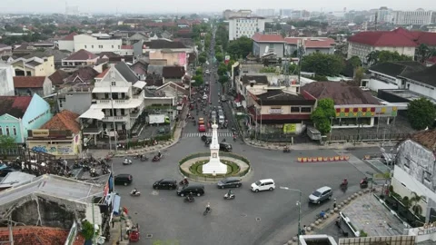 Timelapse or Hyperlapse aerial view of Tugu Jogja or Yogyakarta Monument, Stock Footage 256294693