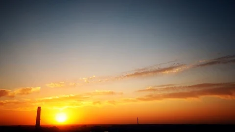 Timelapse orange sky with clouds over the city Stock Footage 118160140