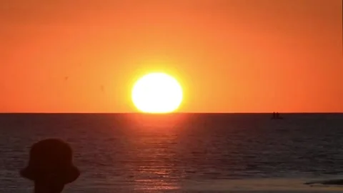 Timelapse of orange sunset reflected on sea italian summer Stock Footage 197457694