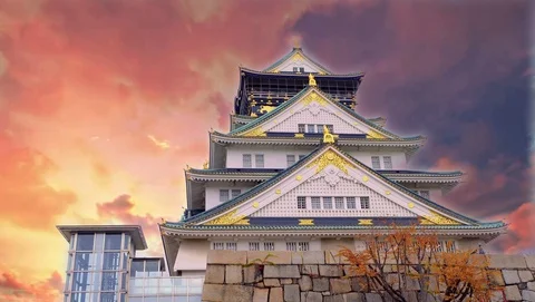 Timelapse Osaka Castle with blue sky  Stock Footage 128478722