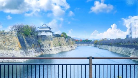 Timelapse Osaka Castle with blue sky  Stock Footage 128478816