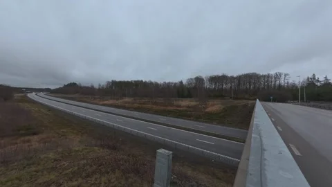 Timelapse over the E6 european highway from an overpass. Stock Footage 294990179