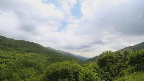 Timelapse Over a Green Valley Stock-Footage 91693564