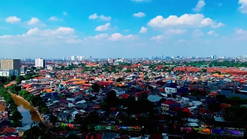 Timelapse over Jakarta city with clouds in the blue sky Stock Footage 330571986