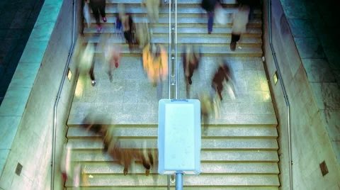Timelapse overhead people walking down steps to underground entrance Stock Footage 49945126