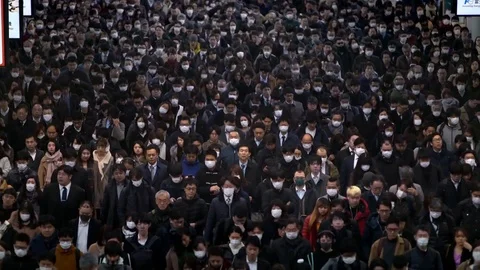 Timelapse overhead view of Japanese passengers walked inside metro station.-Dan Stock Footage 124398271