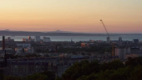 Timelapse panning across a dusky Edinburgh Skyline Stock Footage 77750873