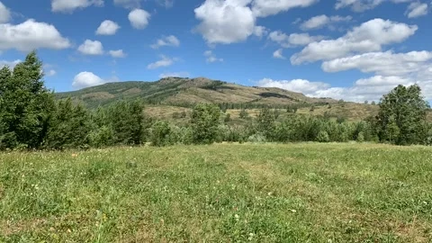 Timelapse. Panoramic view. Beautiful summer landscape. Mountains, blue sky and Stock-Footage 133832124