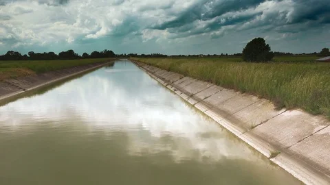 Timelapse of panoramic view of irrigation channel Stock Footage 75656084