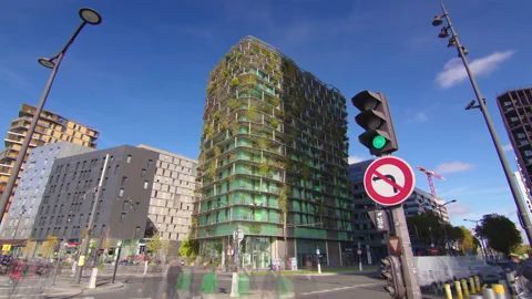 Timelapse of Paris business district and ecological skyscraper with many trees Stock Footage 219964489