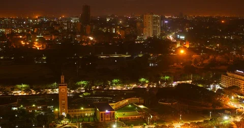 Timelapse of Parliament and clock tower in Nairobi on a cloudy night from a Stock Footage 81587090