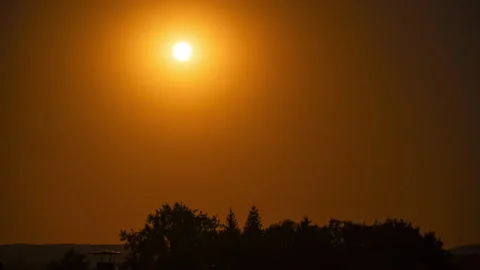 Timelapse of a partial solar eclipse during sunset in the Czech Republic Stock Footage 342133018