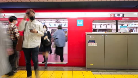 Timelapse of Passenger board the Metro Train on Marunouchi Line Stock Footage 189497079