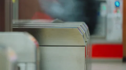 Timelapse passengers going through ticket scanner turnstile tourniquet in subway Stock Footage 273336597