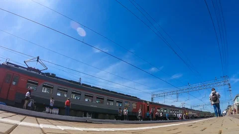 Timelapse of passengers, railway stop, platform Stock-Footage 129561567