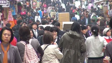Timelapse pedestrian people crowd commuting in Seoul city bustling market street Stock Footage 85765097