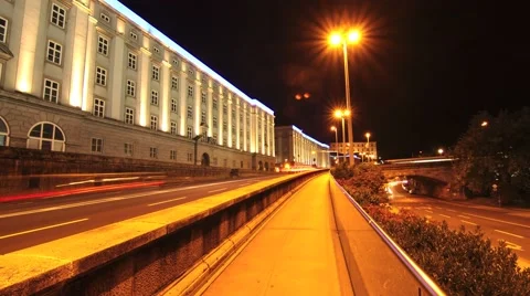 Timelapse of pedestrians and traffic passing by in Linz at night Stock Footage 44233155