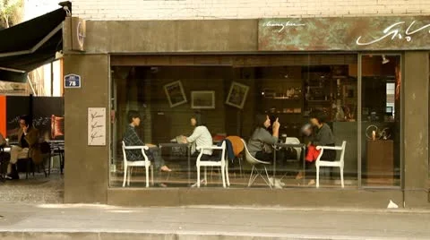 Timelapse of pedestrians in front of coffee cafe Stock Footage 8927010