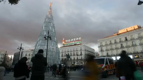 Timelapse of pedestrians at Puerta del Sol in Madrid, Spain during Christmas Stock Footage 166032304