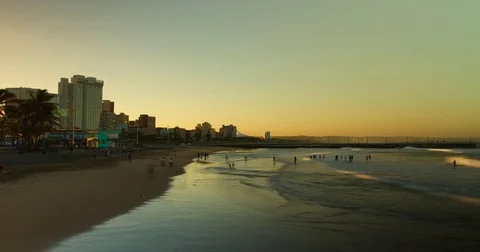 Timelapse of people at the beach during sunset in Durban, South Africa. Stock Footage 81570728
