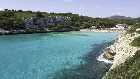 Timelapse of people at beach in small bay mallorca spain Stock Footage 155152384