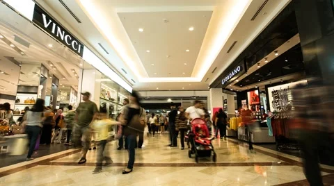 Timelapse of People In Front of Vincci and Giardano Stores in Suria KLCC Mall Stock Footage 49766672