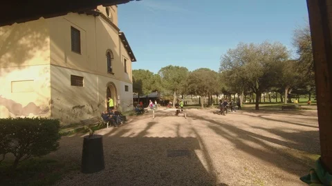 Timelapse-People in a park, doing jog, running, riding bike,  walking, relaxing Stock Footage 88285800